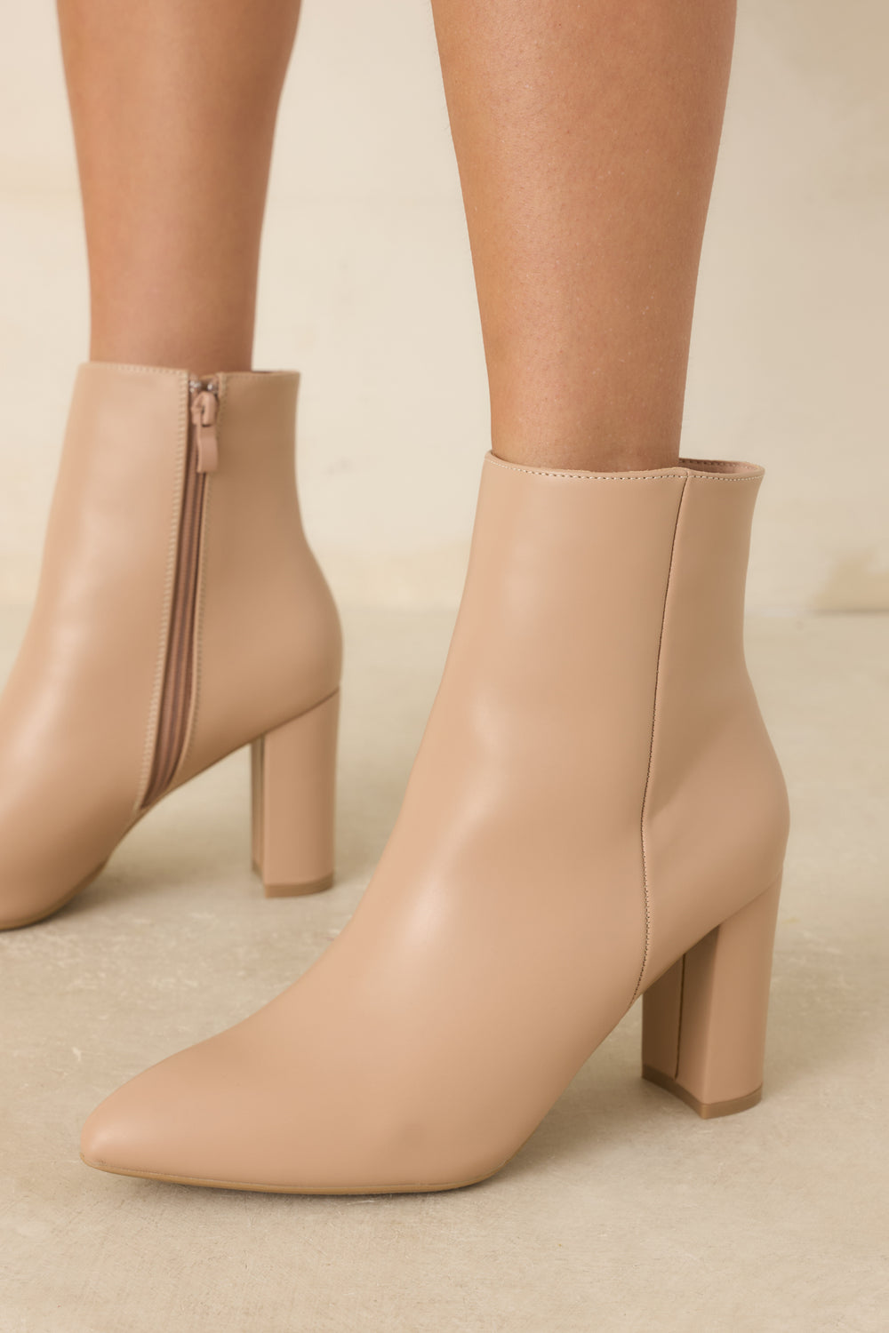 Angled-View-Of-Ankle-Boots-With-Inner-Zipper
