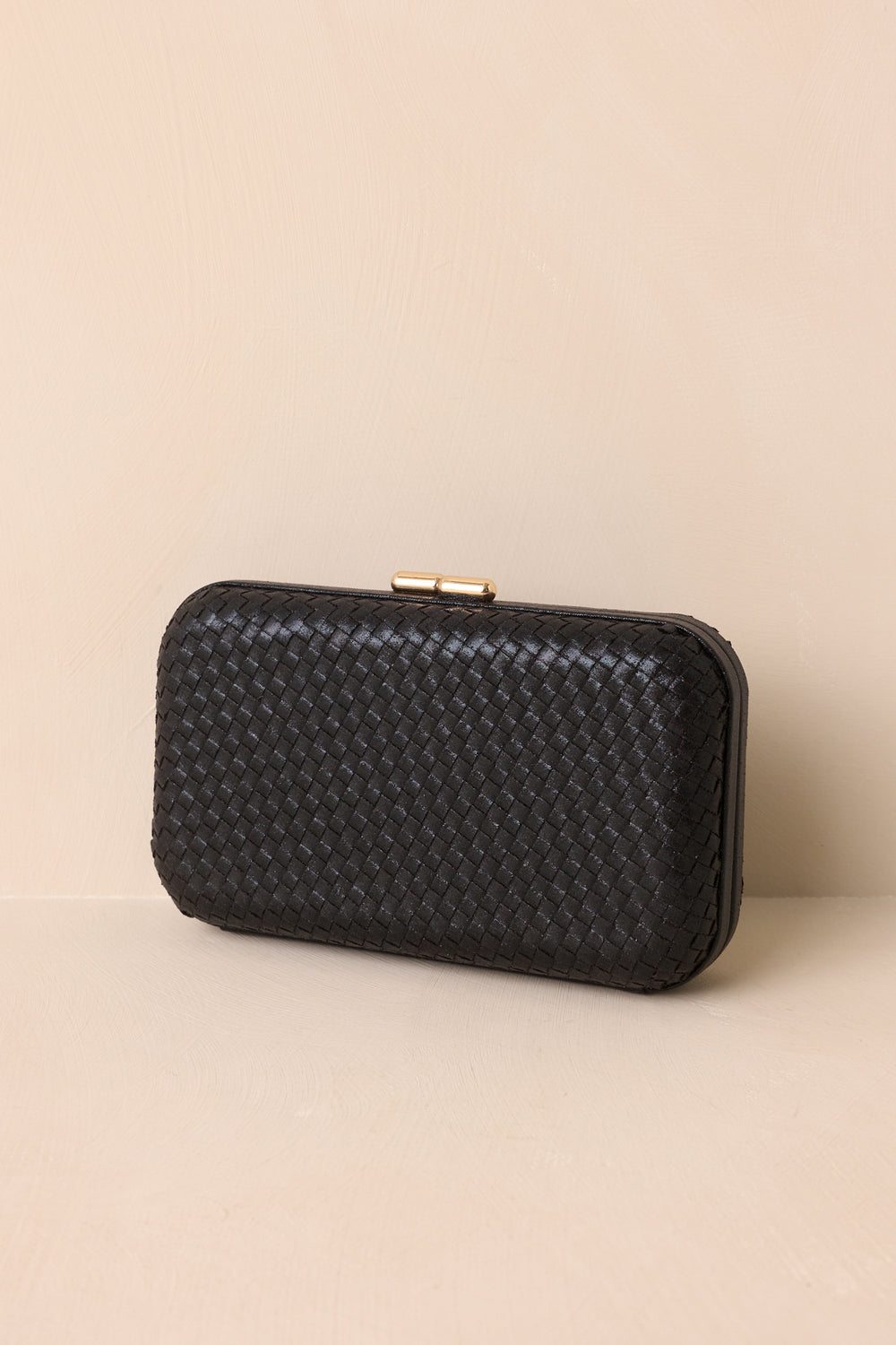 Black-Clutch-With-A-Rectangular-Shape-And-Rounded-Edges