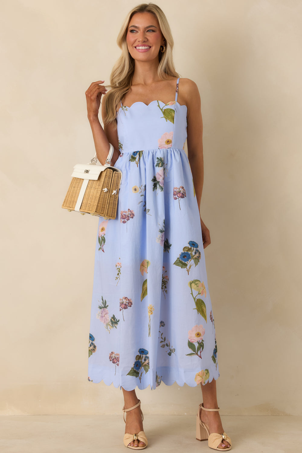 Blue-Floral-Midi-Dress-Featuring-A-Fitted-Bodice