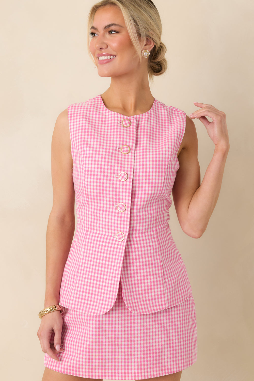 Cropped-View-Focusing-On-The-Gingham-Pattern-And-Button-Front