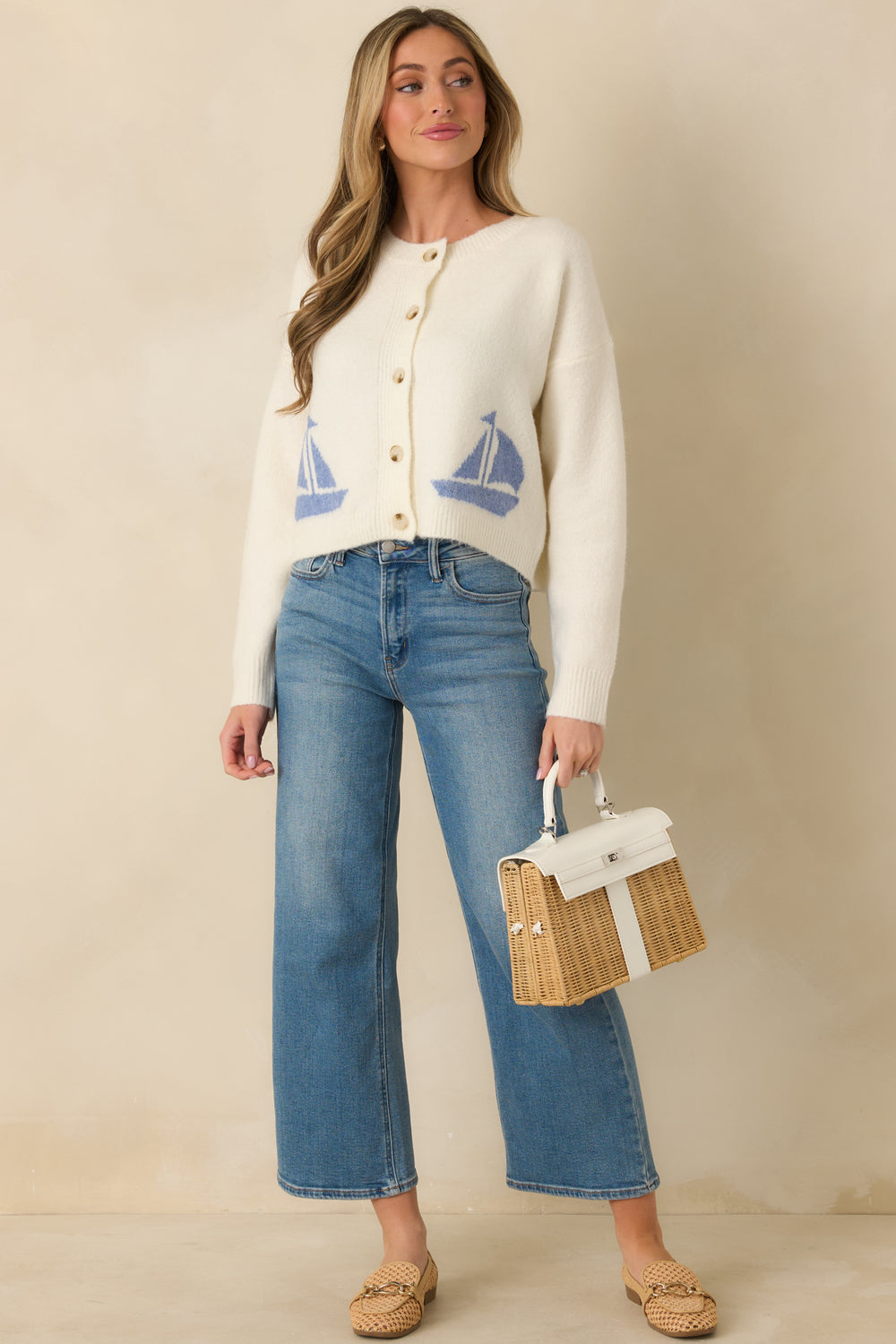 Front-View-Of-Ivory-Knit-Cardigan-With-Classic-Round-Neckline