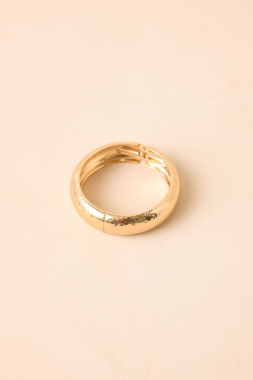 Hammered-Gold-Cuff-With-Curved-Shape