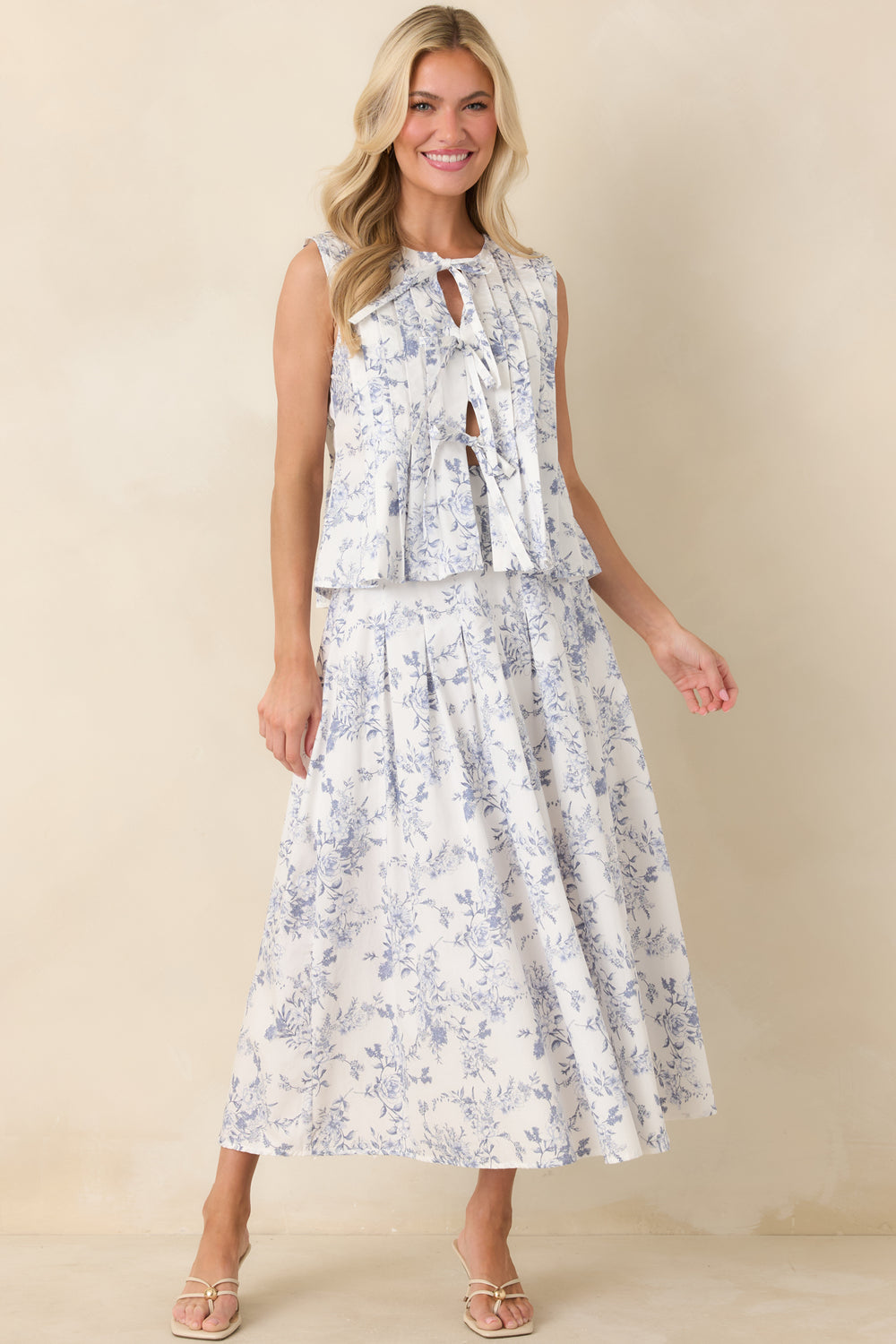 Ivory-Floral-Sleeveless-Top-With-Adjustable-Front-Bows