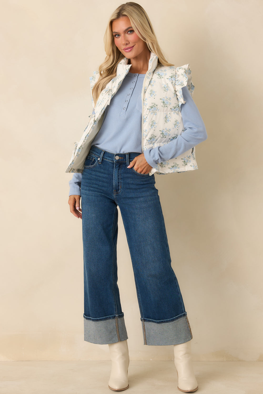 Ivory-Puffer-Vest-With-Allover-Blue-Floral-Pattern