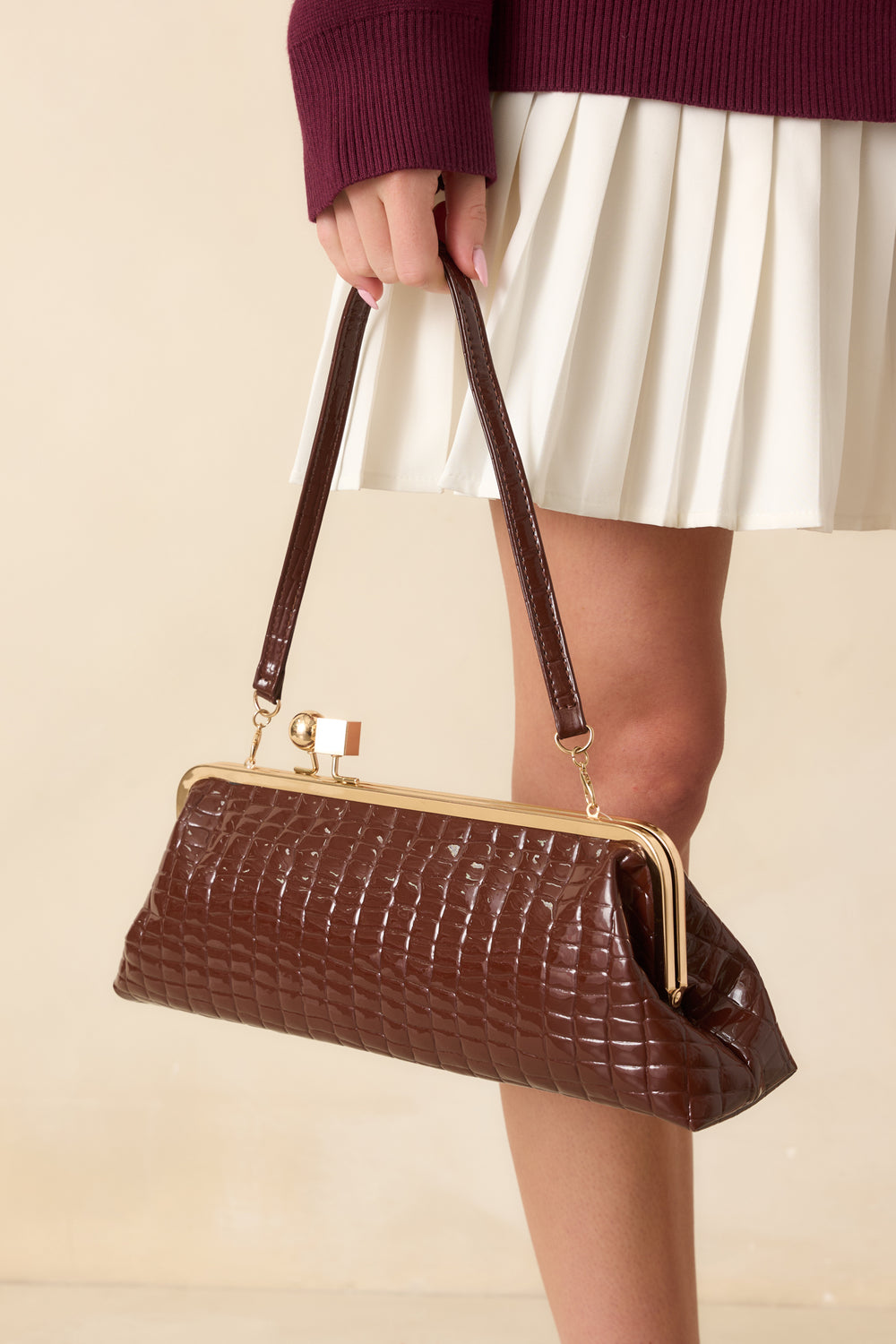 Rectangular-Brown-Croc-Embossed-Clutch-Showing-Gold-Kiss-Lock