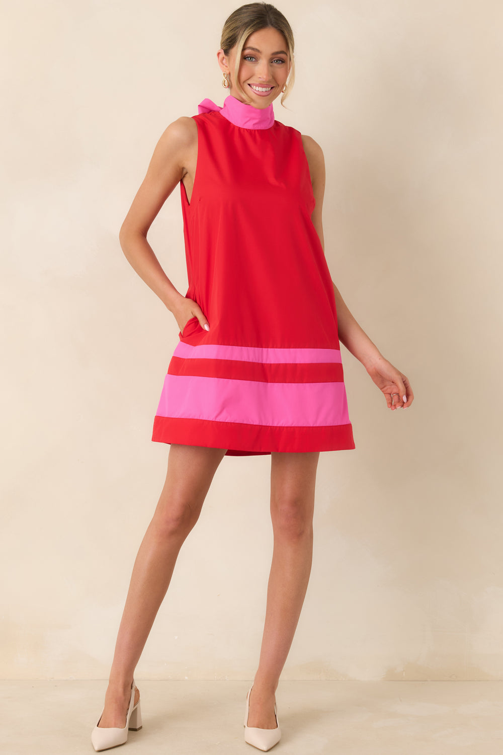 Sleeveless-Mini-Dress-In-A-Playful-Color-And-Clean-Drape