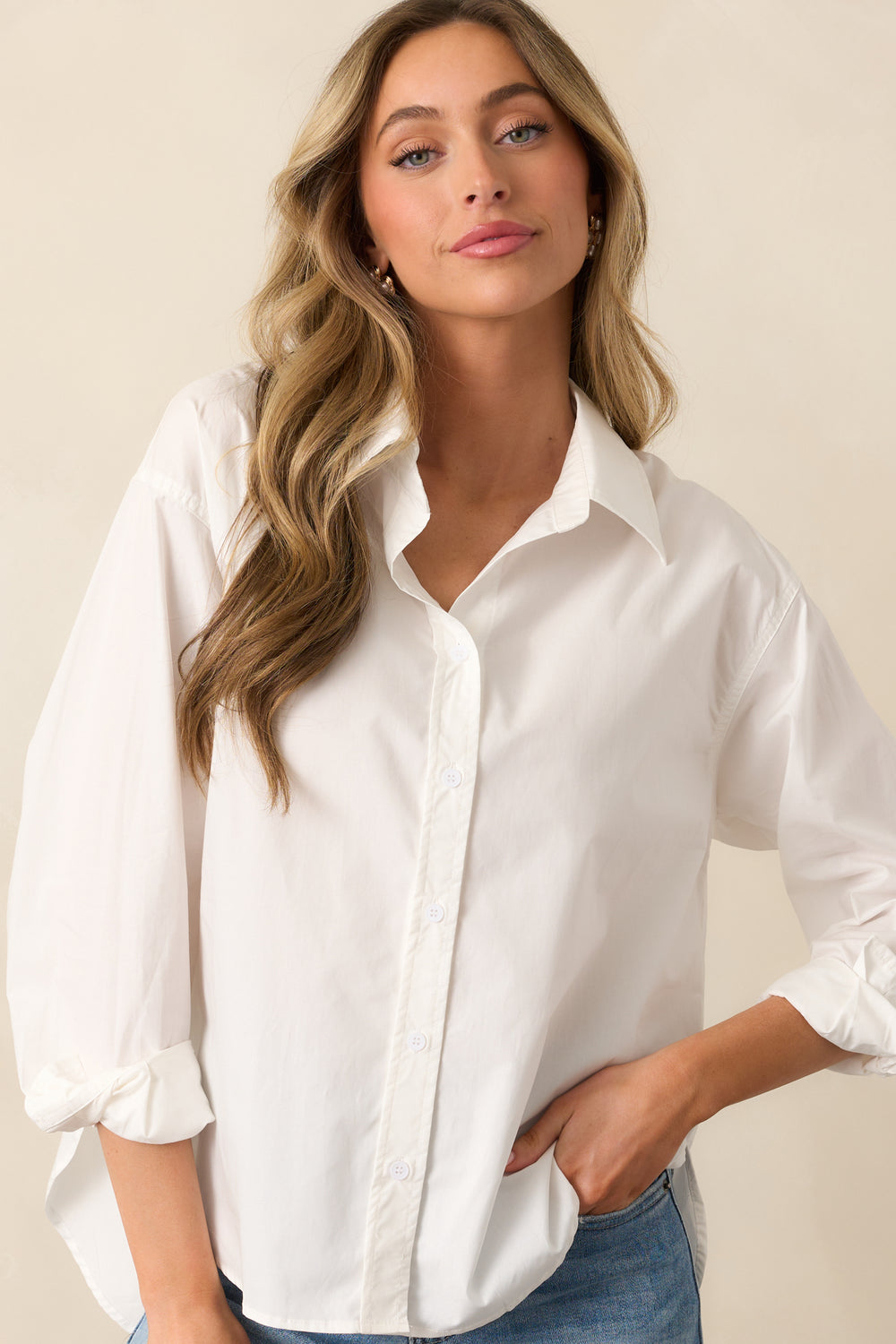 The-Long-Sleeves-And-Button-Cuffs-On-The-White-Top