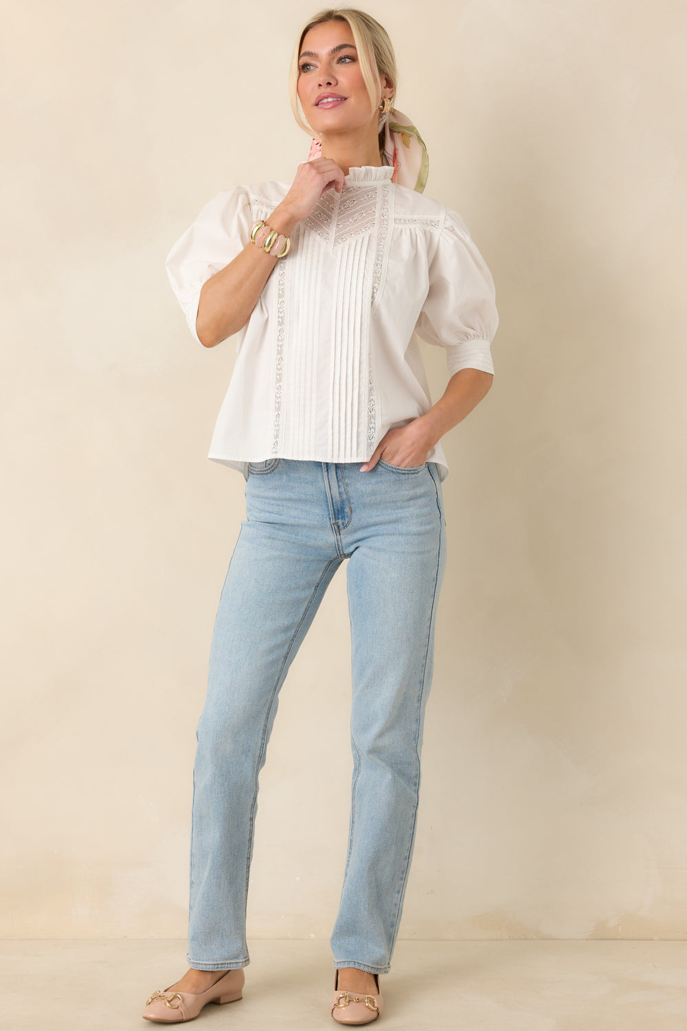 White-Blouse-Showing-The-Pintuck-Detailing-And-Ruffled-High-Neckline