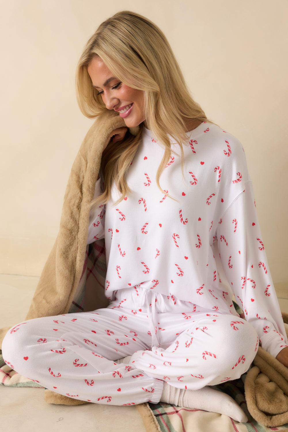 White-Festive-Top-With-Crew-Neckline-And-Candy-Cane-Pattern