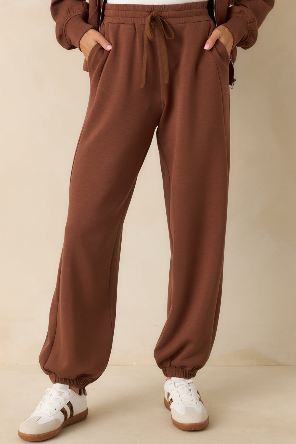 brown-elastic-waist-drawstring-joggers-waist-down-front-view